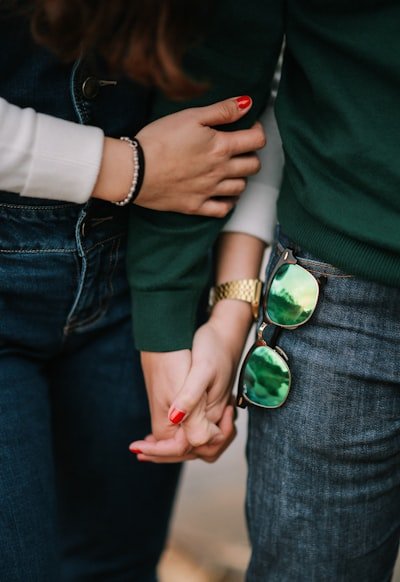 couples holding hand each other